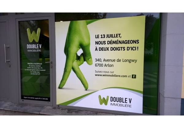 Double V Immobilière vitrine